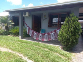 Casa aconchegante próximo a praia, 2 dormitórios